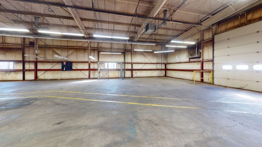 High ceiling warehouse interior at 481 Sullivan Avenue in South Windsor